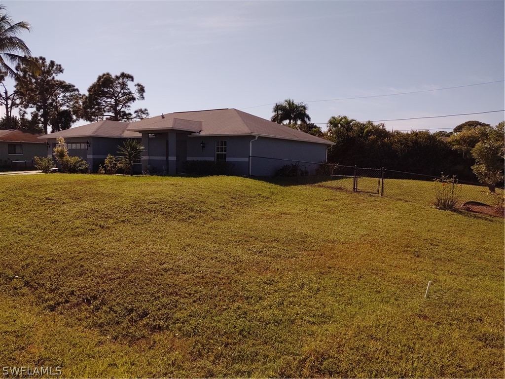 17532 Butler Road Fort Myers, FL 33967 - Photo 29 of 29 a house view with a lake