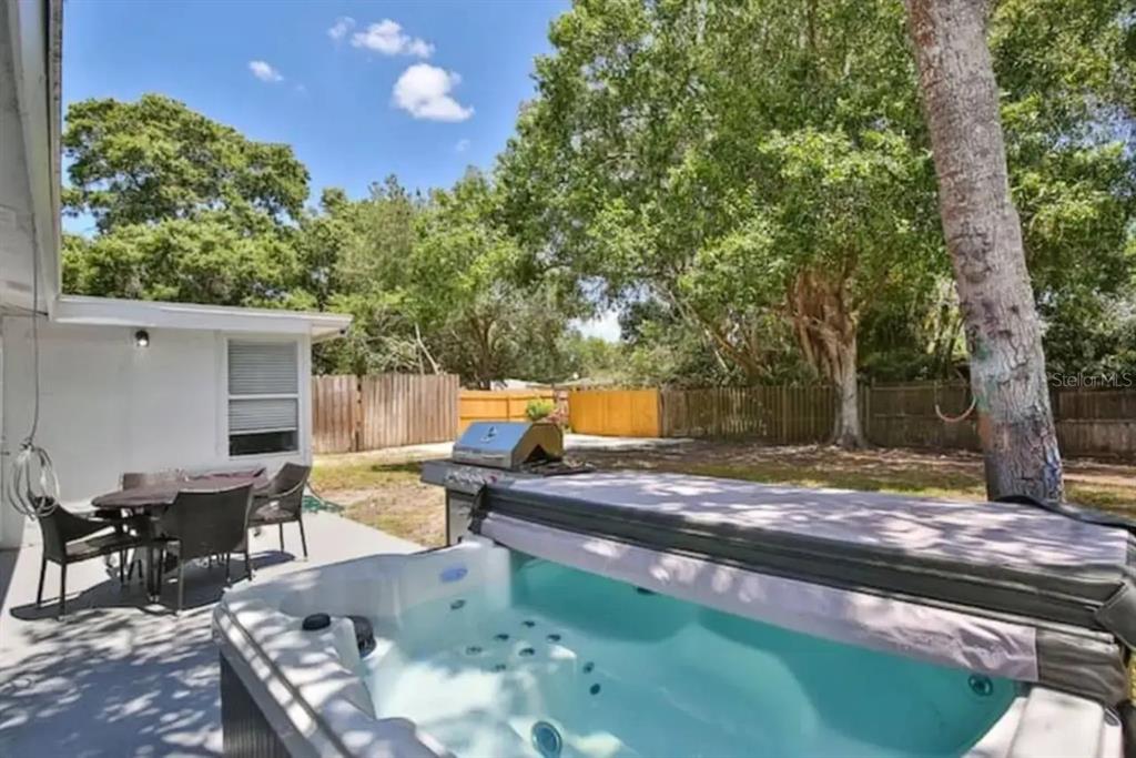 3113 McIntosh Road Sarasota, FL 34232 - Photo 3 of 22 a view of a backyard with sitting area