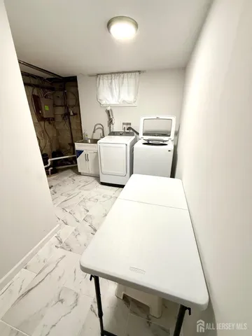 a view of kitchen and sink