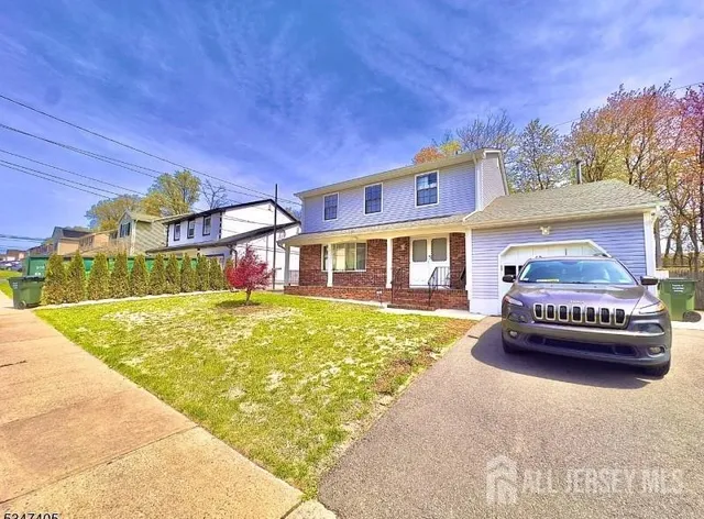 a front view of a house with swimming pool