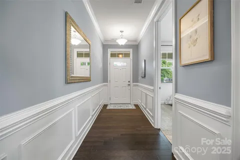 a view of a hallway with windows