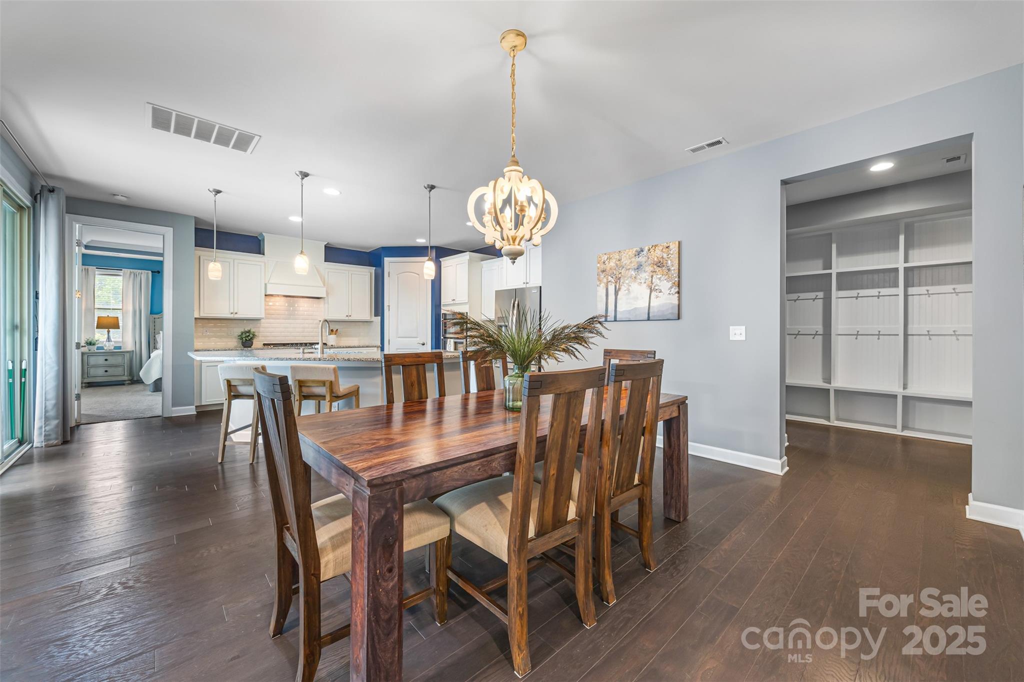 1284 Independence Street Fort Mill, SC 29708 - Photo 2 of 34 a view of a dining room with furniture and wooden floor