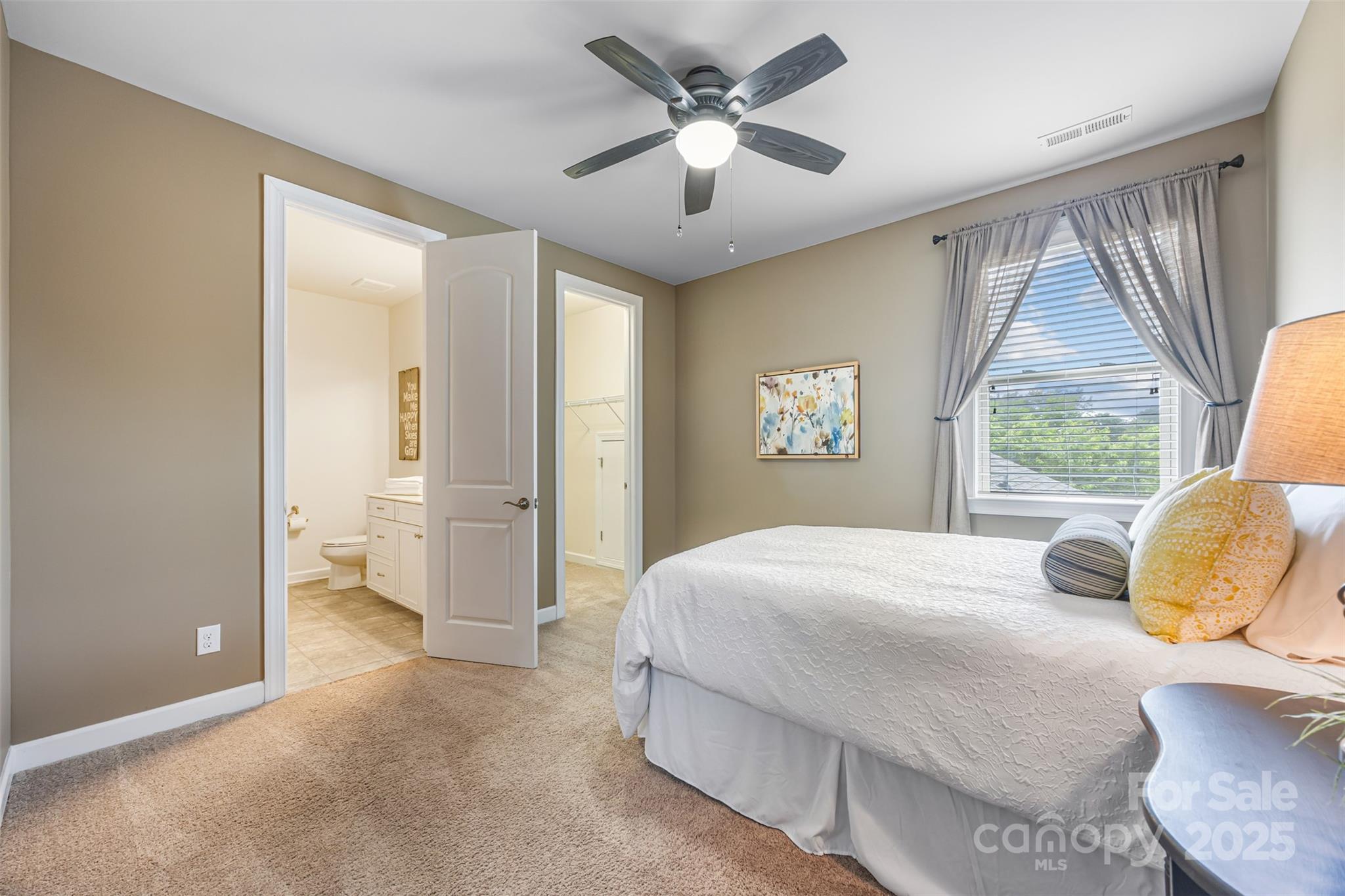 1284 Independence Street Fort Mill, SC 29708 - Photo 21 of 34 a bedroom with a bed and a large window