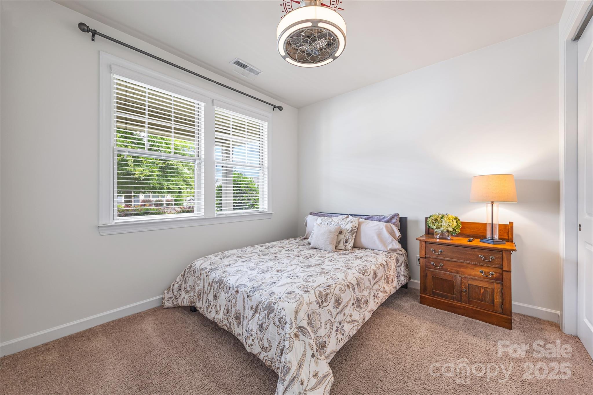 1284 Independence Street Fort Mill, SC 29708 - Photo 23 of 34 a bedroom with a bed and a window