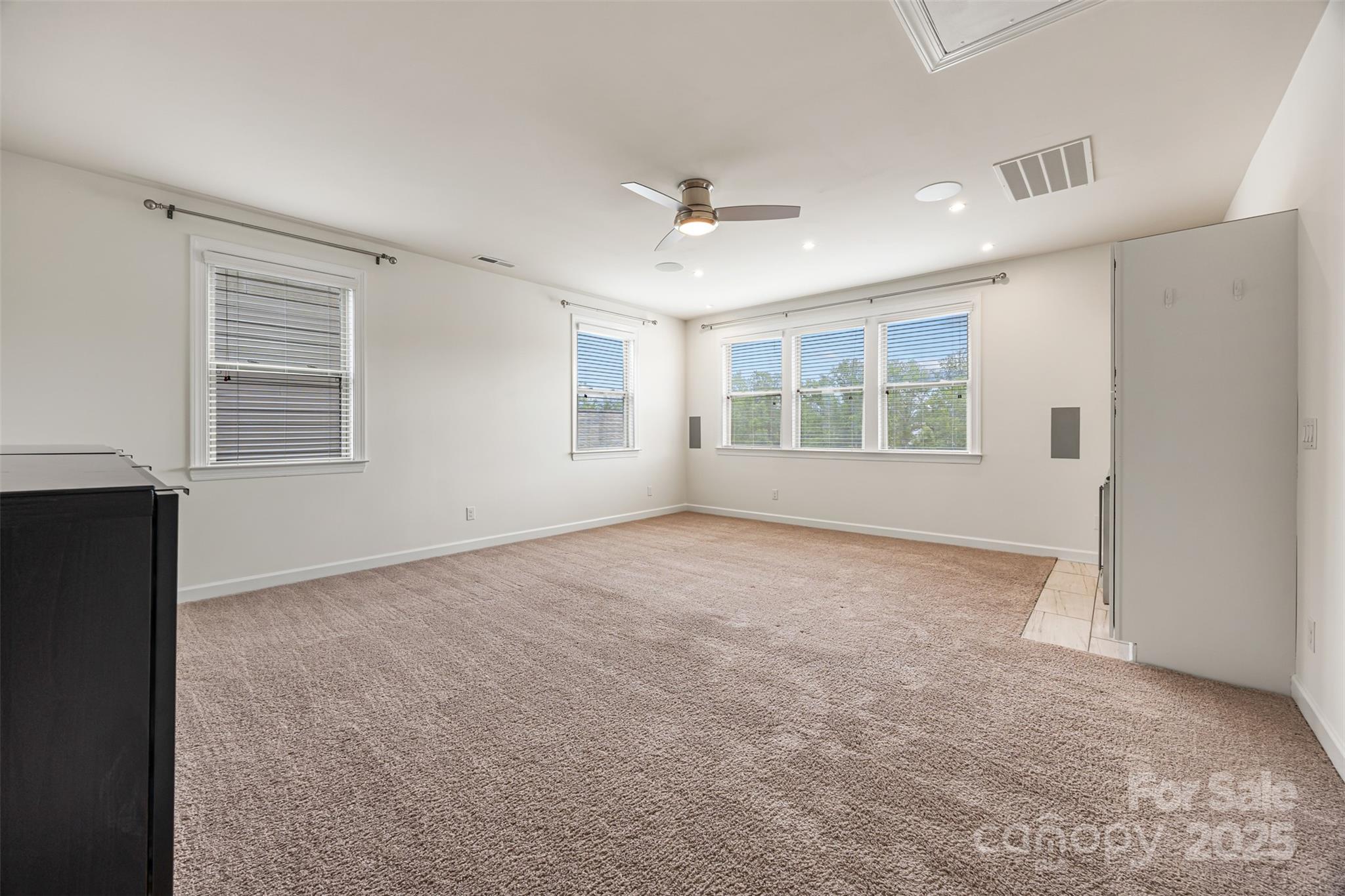 1284 Independence Street Fort Mill, SC 29708 - Photo 24 of 34 an empty room with windows and closet