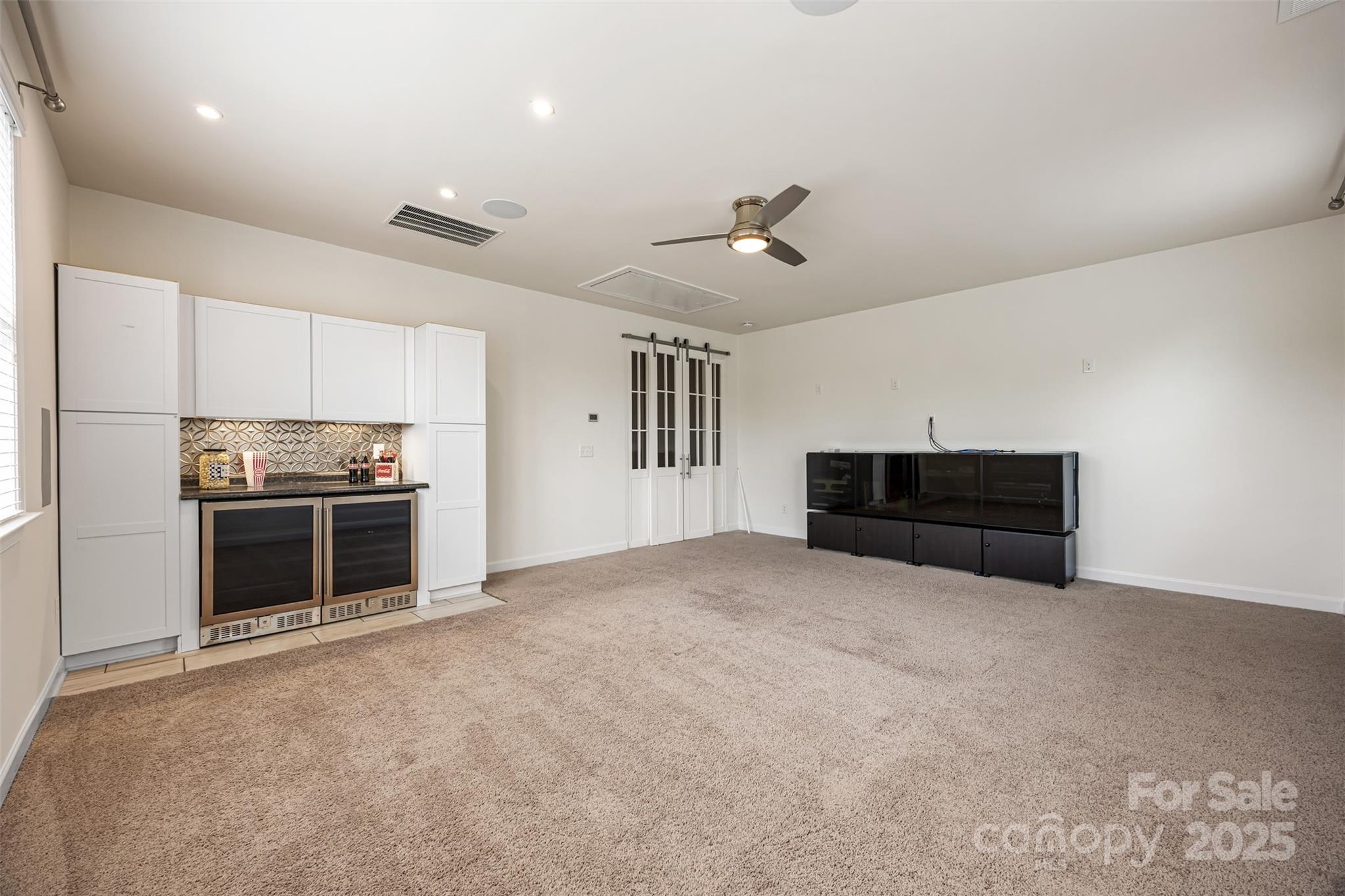 1284 Independence Street Fort Mill, SC 29708 - Photo 25 of 34 a view of an empty room with kitchen and window