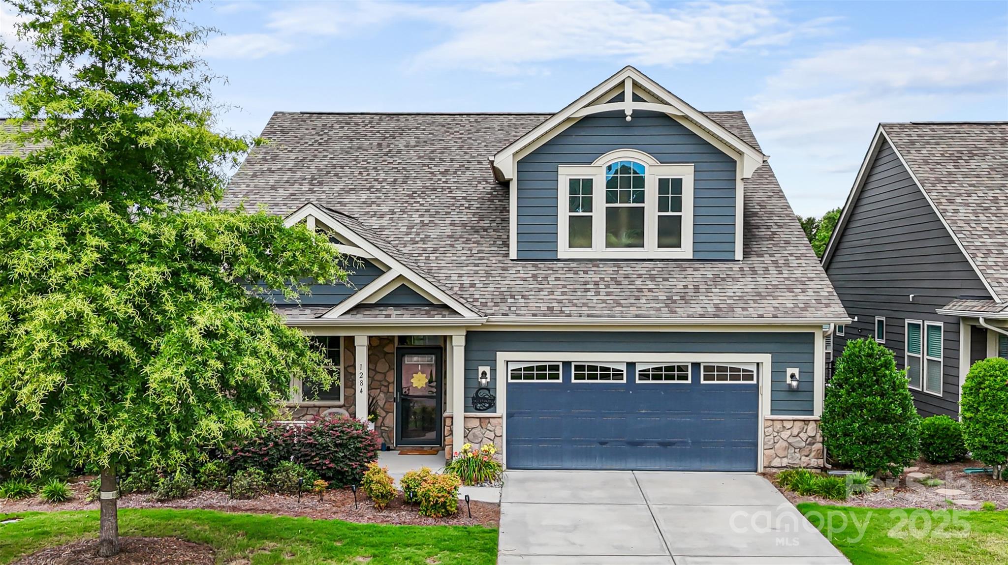 1284 Independence Street Fort Mill, SC 29708 - Photo 32 of 34 a front view of a house with garden