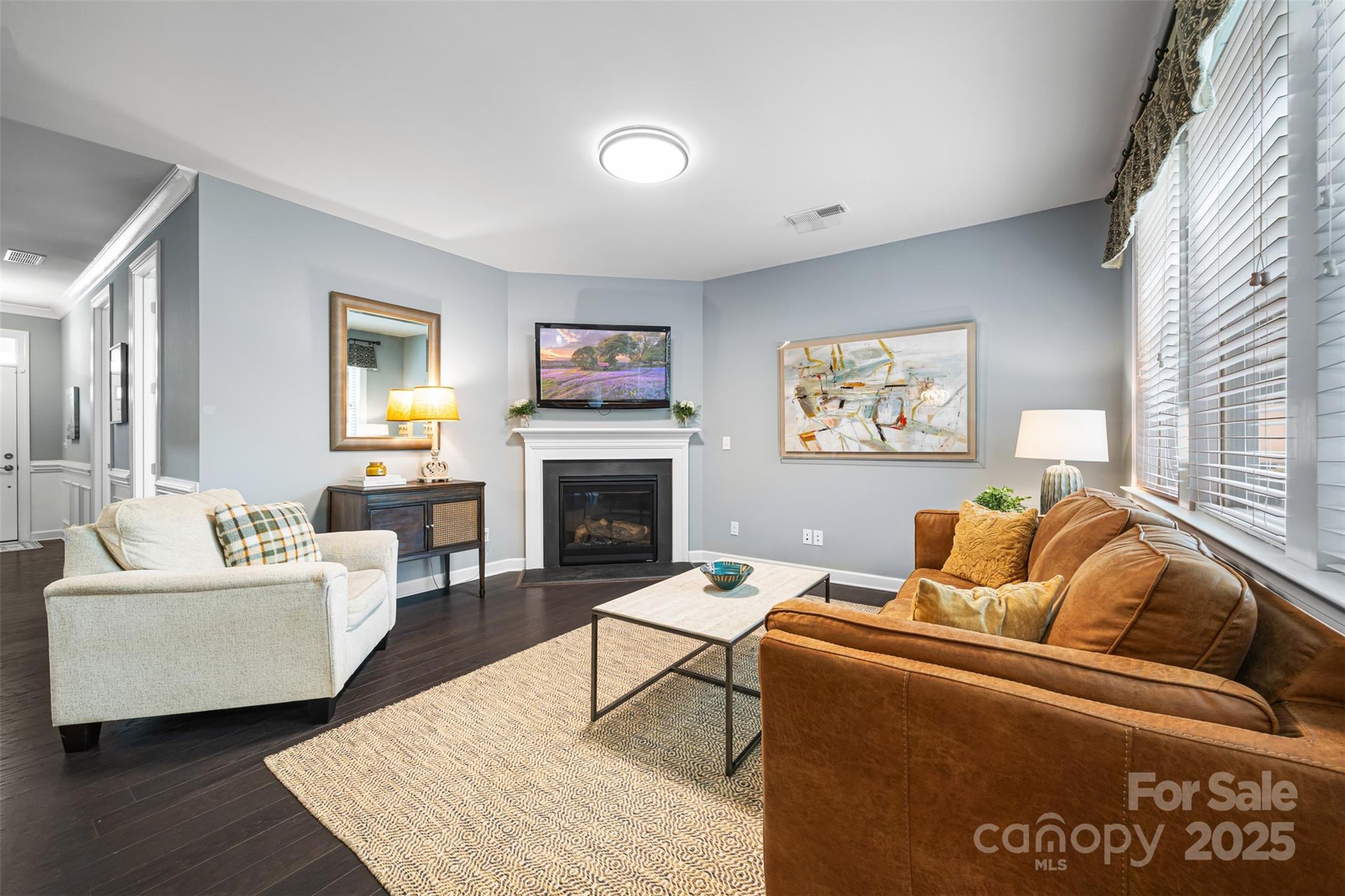 1284 Independence Street Fort Mill, SC 29708 - Photo 4 of 34 a living room with furniture and a fireplace