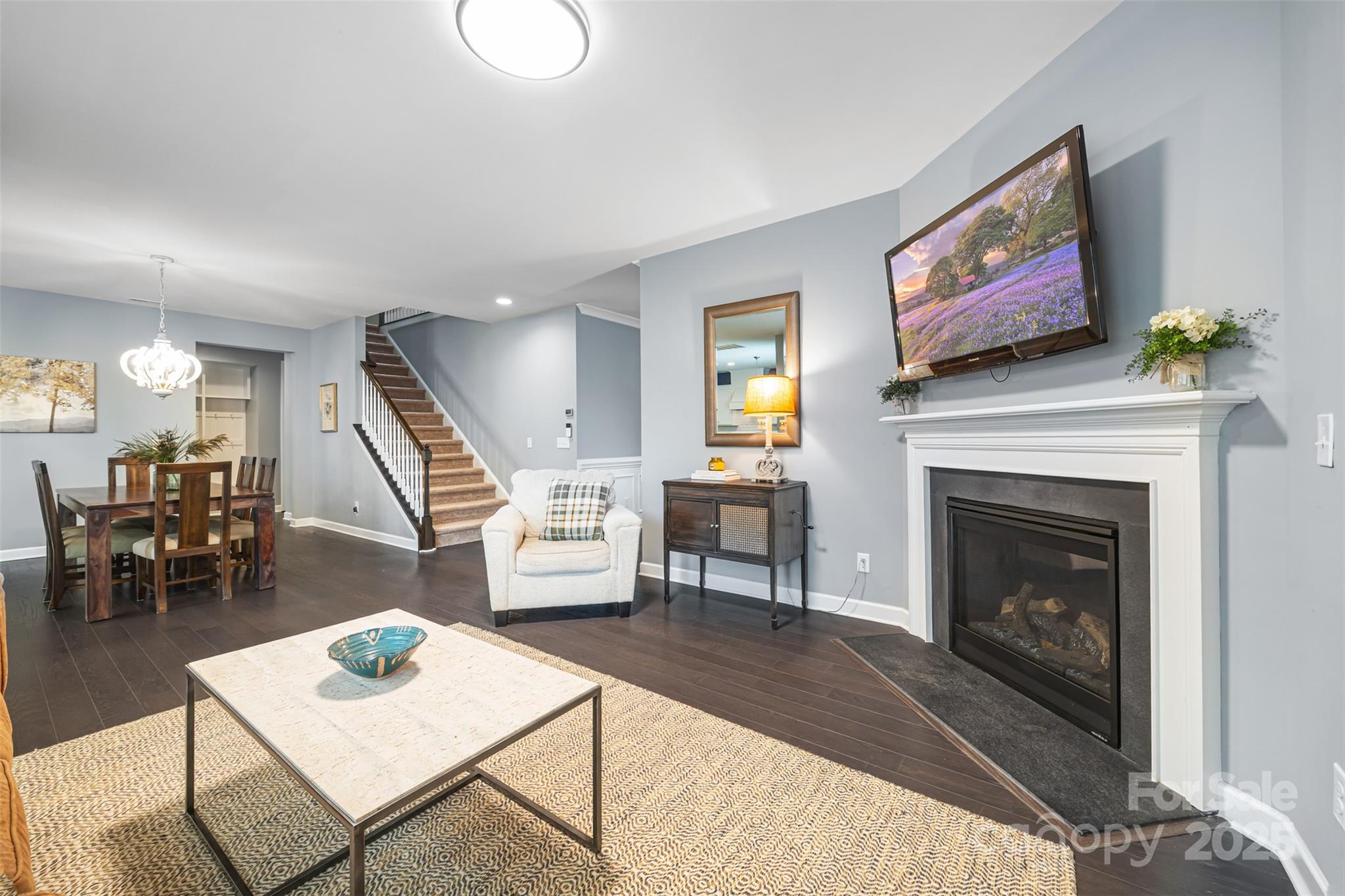 1284 Independence Street Fort Mill, SC 29708 - Photo 5 of 34 a living room with furniture and a fireplace
