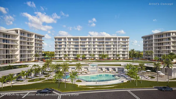 a view of swimming pool with outdoor seating
