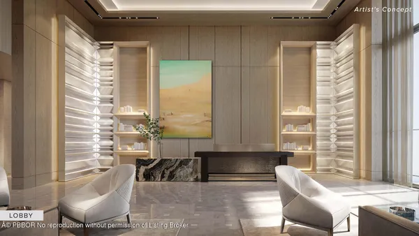 a living room with furniture and floor to ceiling windows