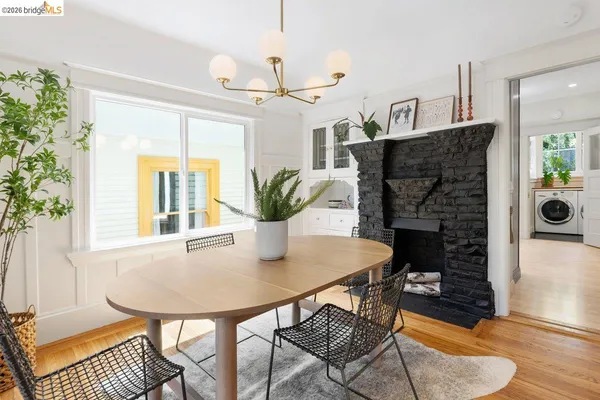 a kitchen with a sink a stove and cabinets