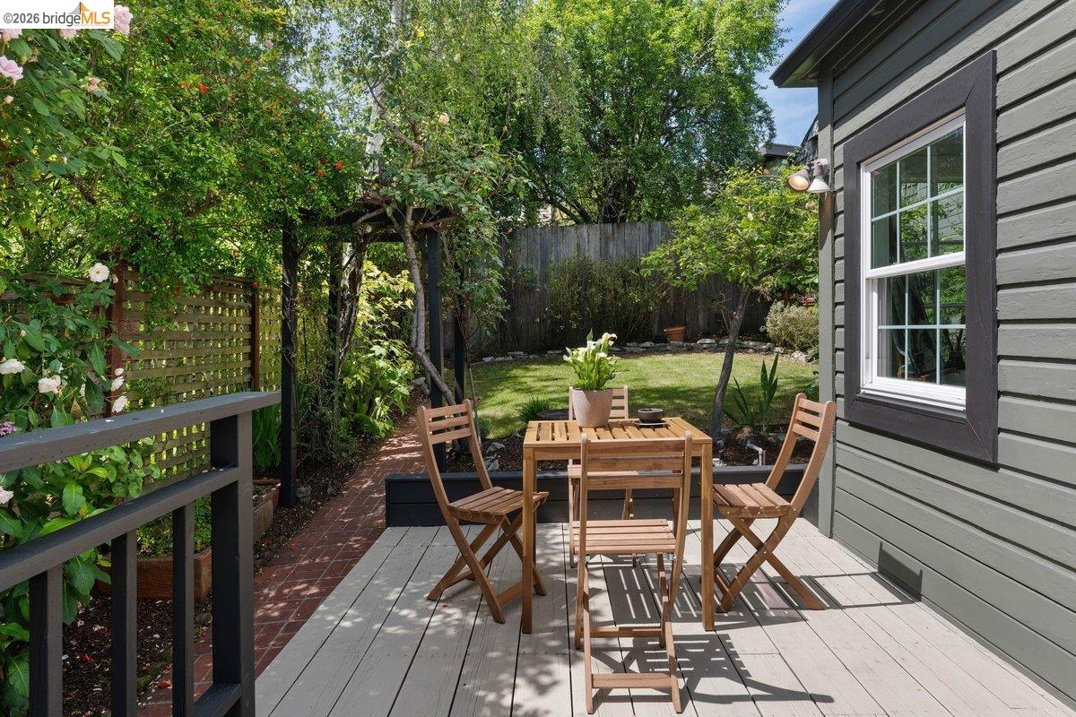 4369 Howe Street Oakland, CA 94611 - Photo 26 of 38 a view of a dinning table and chairs in the balcony