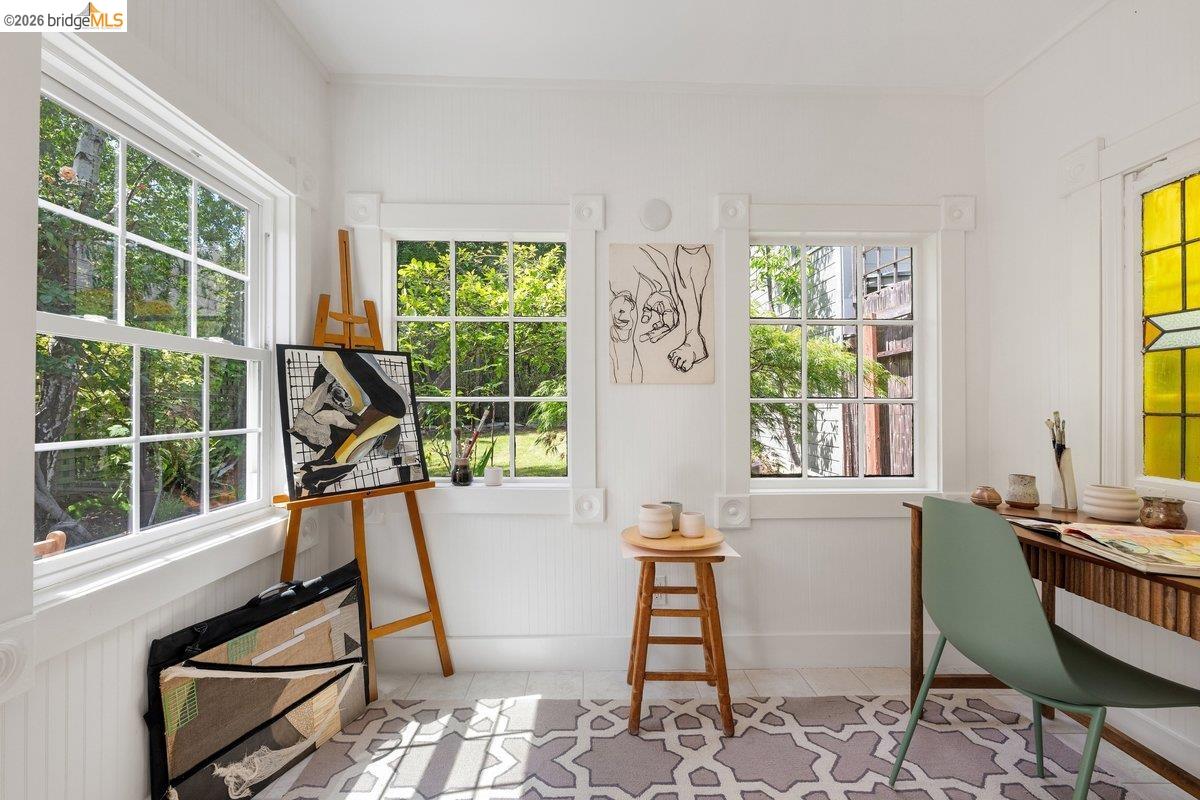 4369 Howe Street Oakland, CA 94611 - Photo 30 of 38 a living room with furniture and a window