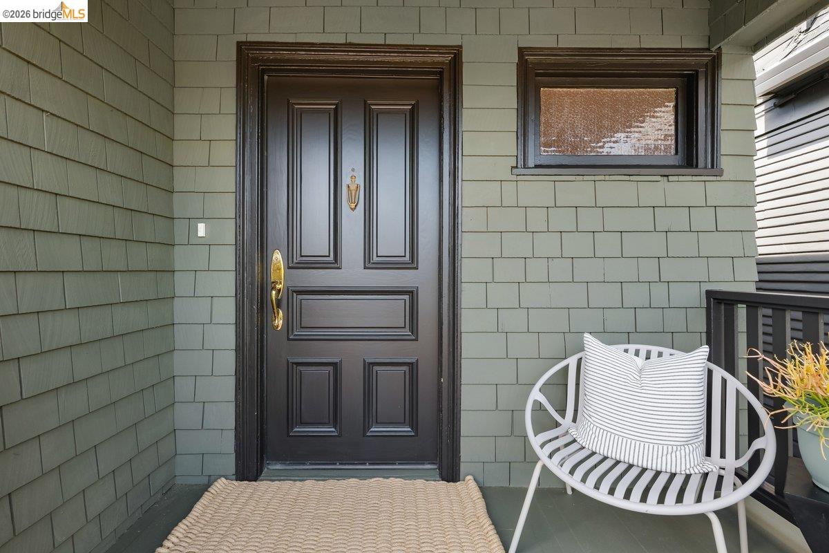 4369 Howe Street Oakland, CA 94611 - Photo 3 of 38 a view of a door and chair in the patio