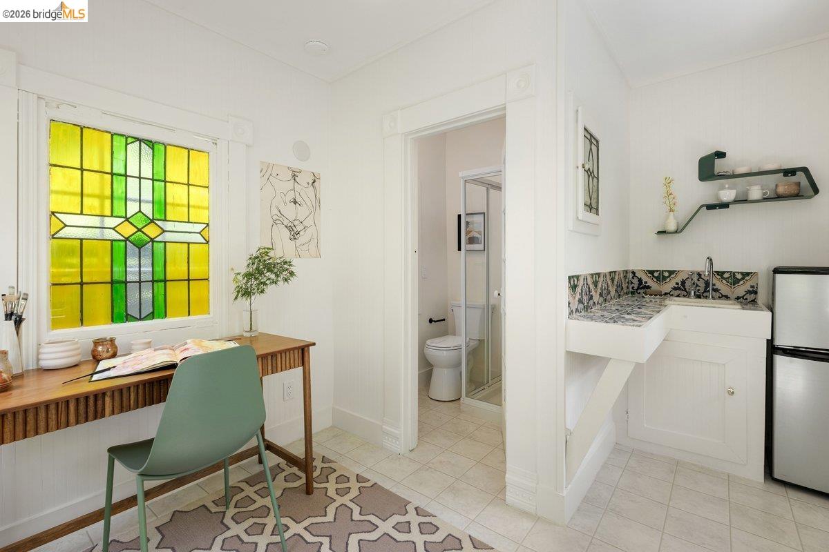4369 Howe Street Oakland, CA 94611 - Photo 31 of 38 a view of a dining room with furniture window and outside view