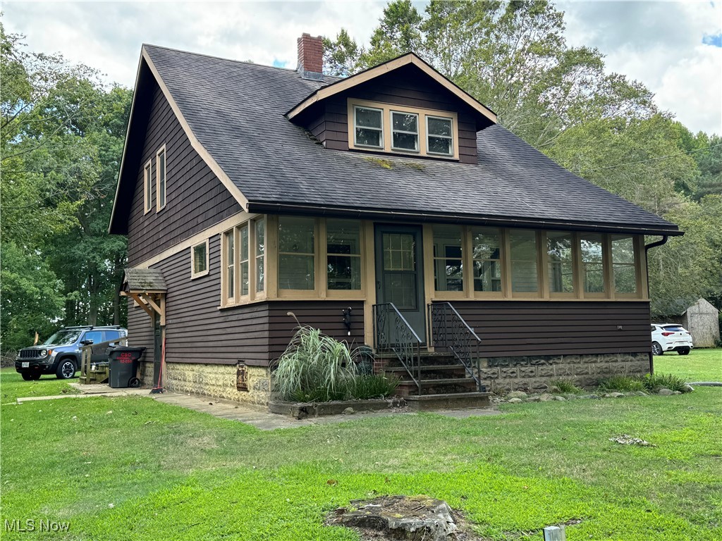 4034 North Bend Road Ashtabula, OH 44004 - Photo 1 of 29 View of front facade with a front yard