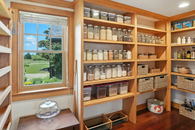 a room with furniture and a book shelf