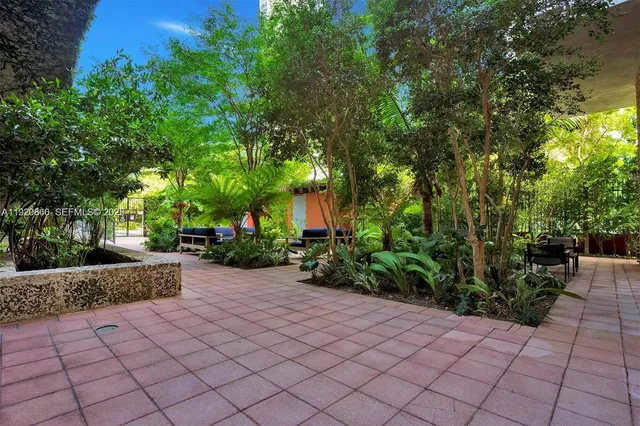 a view of a terrace with sitting area