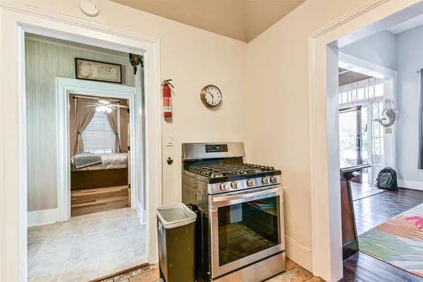 a kitchen with a stove and a microwave