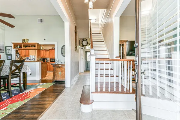 a view of a balcony with wooden floor