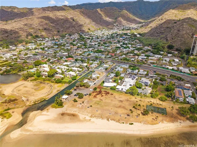 an aerial view of residential building and lake view