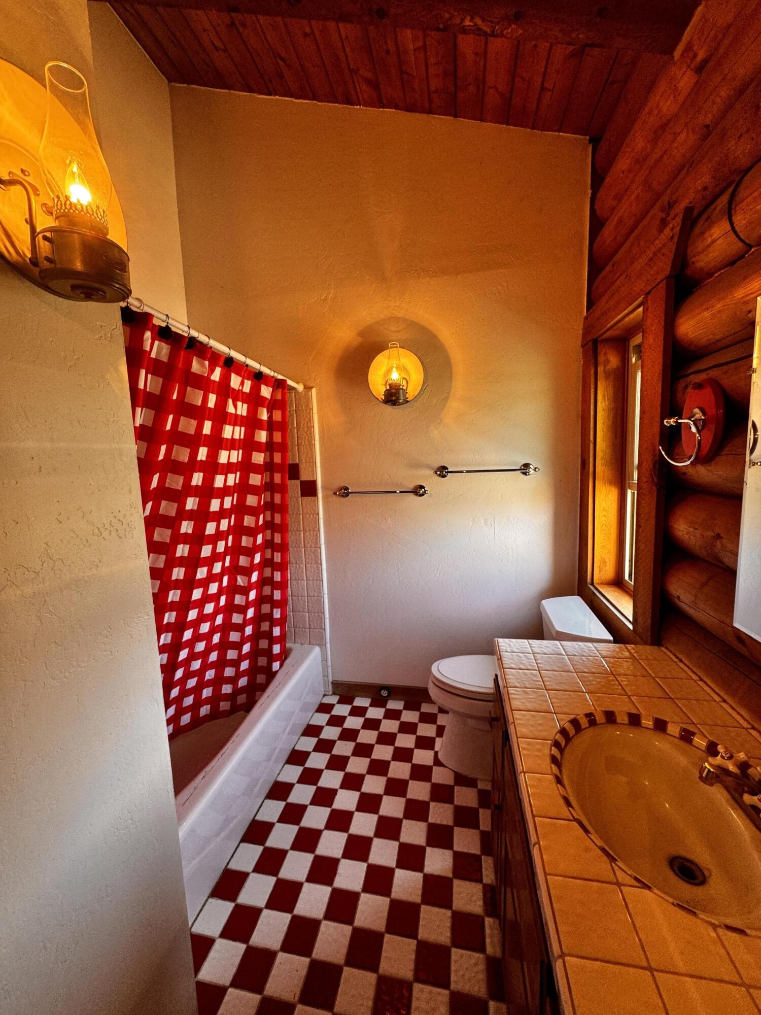 30723 Hamilton Drive Exeter, CA 93221 - Photo 27 of 85 a bedroom with a bed and wooden floor