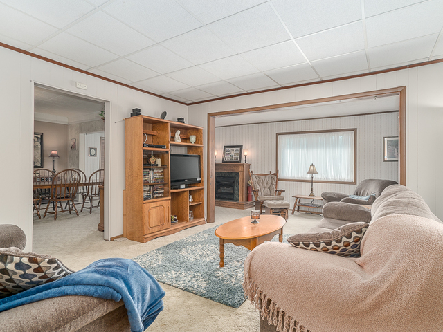 17447 West 2000N Road Reddick, IL 60961 - Photo 14 of 37 a living room with furniture and a flat screen tv