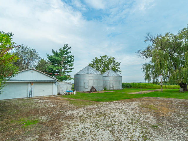 17447 West 2000N Road Reddick, IL 60961 - Photo 28 of 37 a view of a house with a yard and large tree