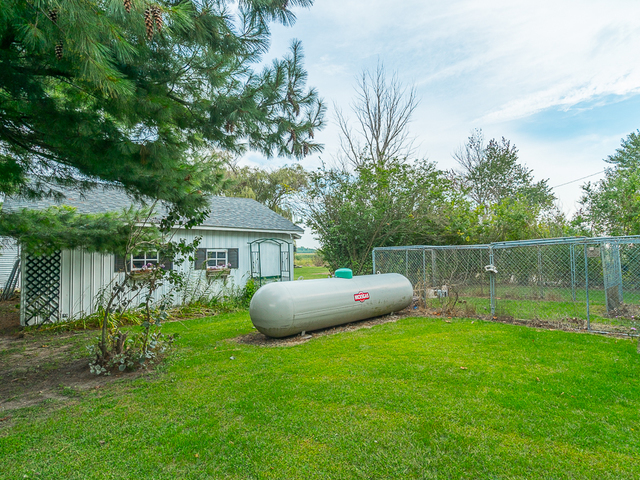 17447 West 2000N Road Reddick, IL 60961 - Photo 32 of 37 a view of a backyard with a garden and plants