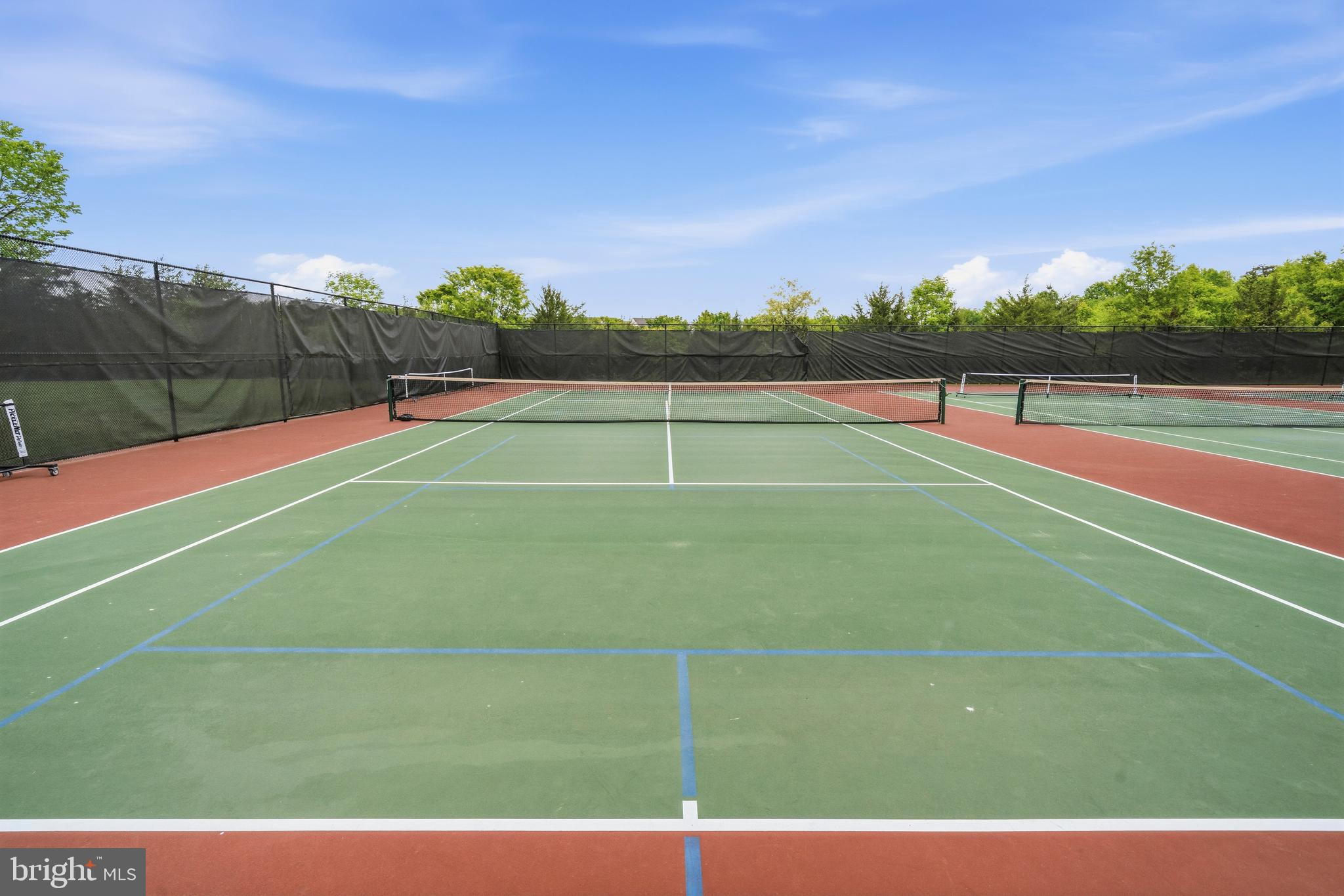 25154 Monteith Terrace Chantilly, VA 20152 - Photo 37 of 40 a view of an outdoor space and tennis court