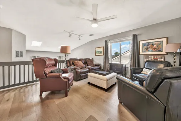 a living room with furniture or couch and a window