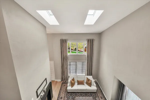 a room with furniture and a window