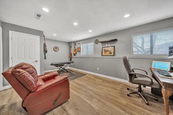 a living room with furniture and a window