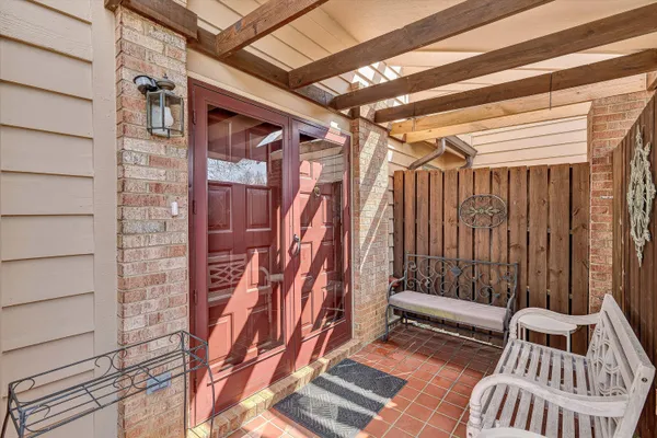 a view of outdoor space with deck and furniture