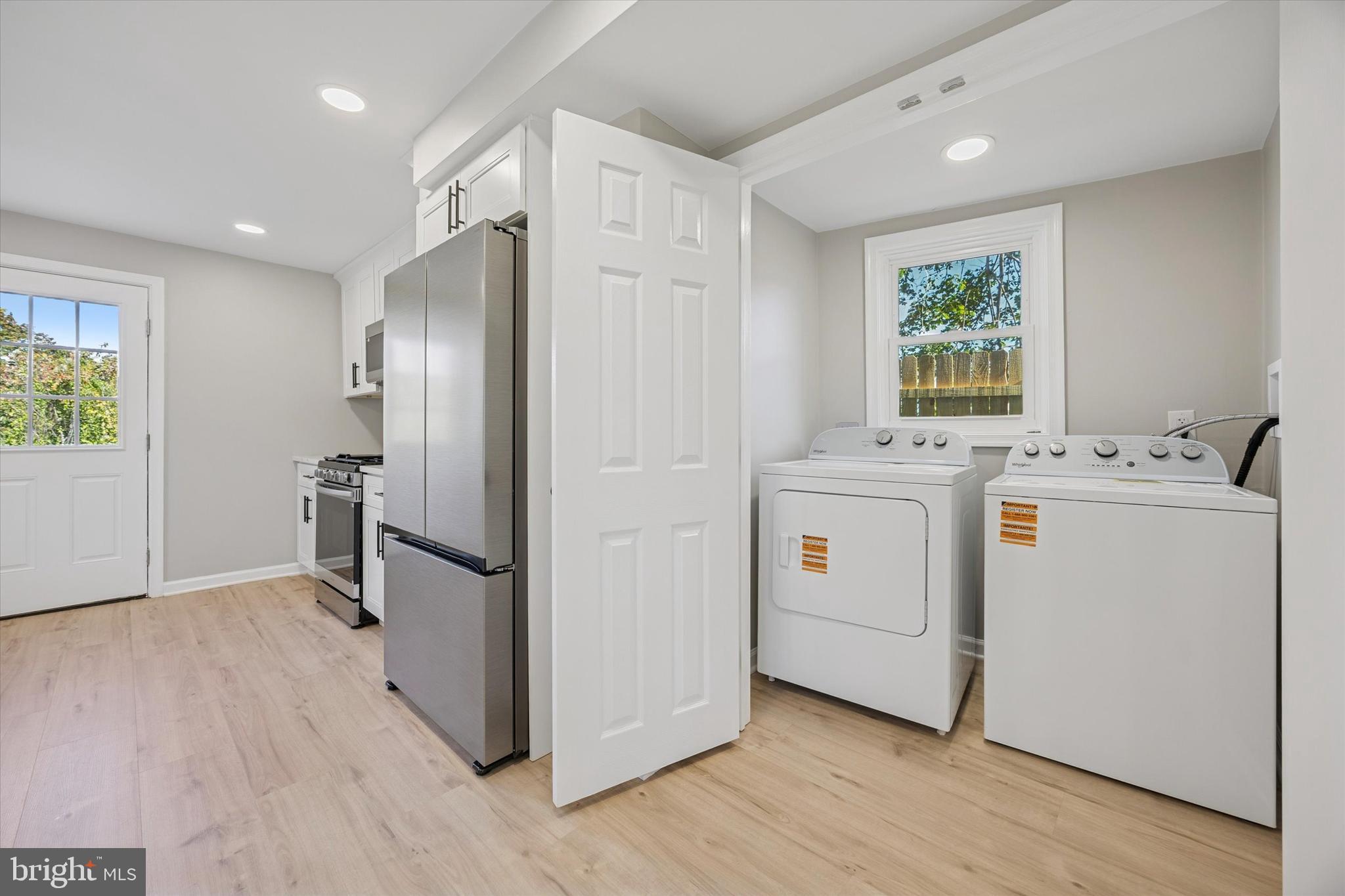 3011 Church Road Lafayette Hill, PA 19444 - Photo 11 of 30 a view of cabinets a refrigerator a stove a microwave and cabinets