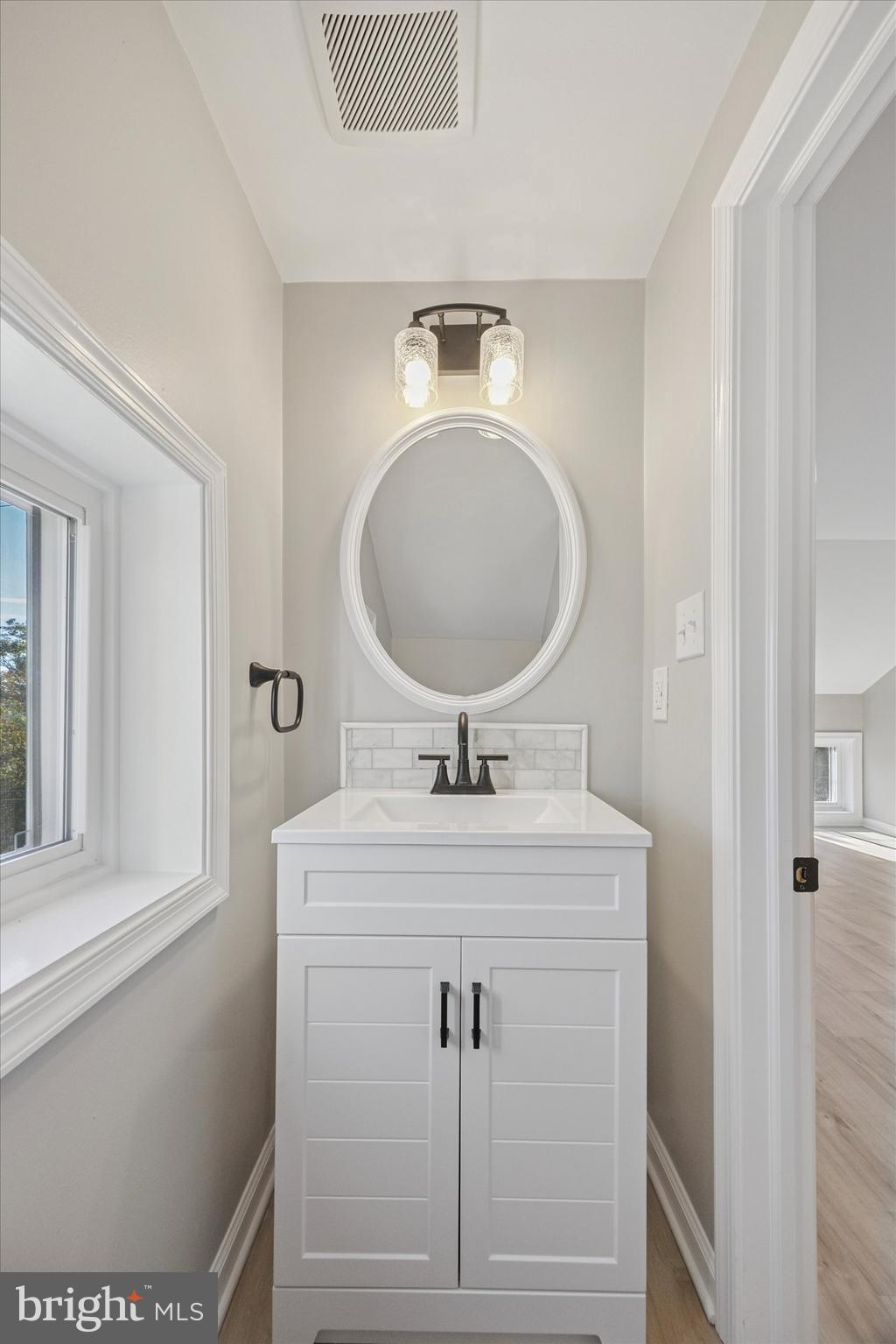 3011 Church Road Lafayette Hill, PA 19444 - Photo 15 of 30 a bathroom with a sink and a mirror