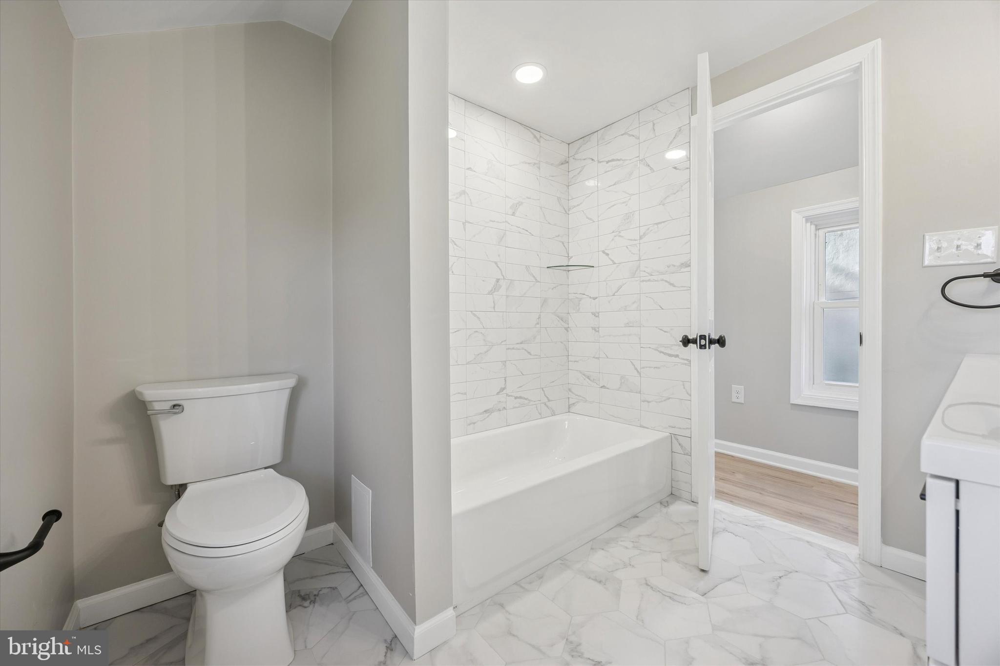3011 Church Road Lafayette Hill, PA 19444 - Photo 22 of 30 a bathroom with a toilet and a bath tub