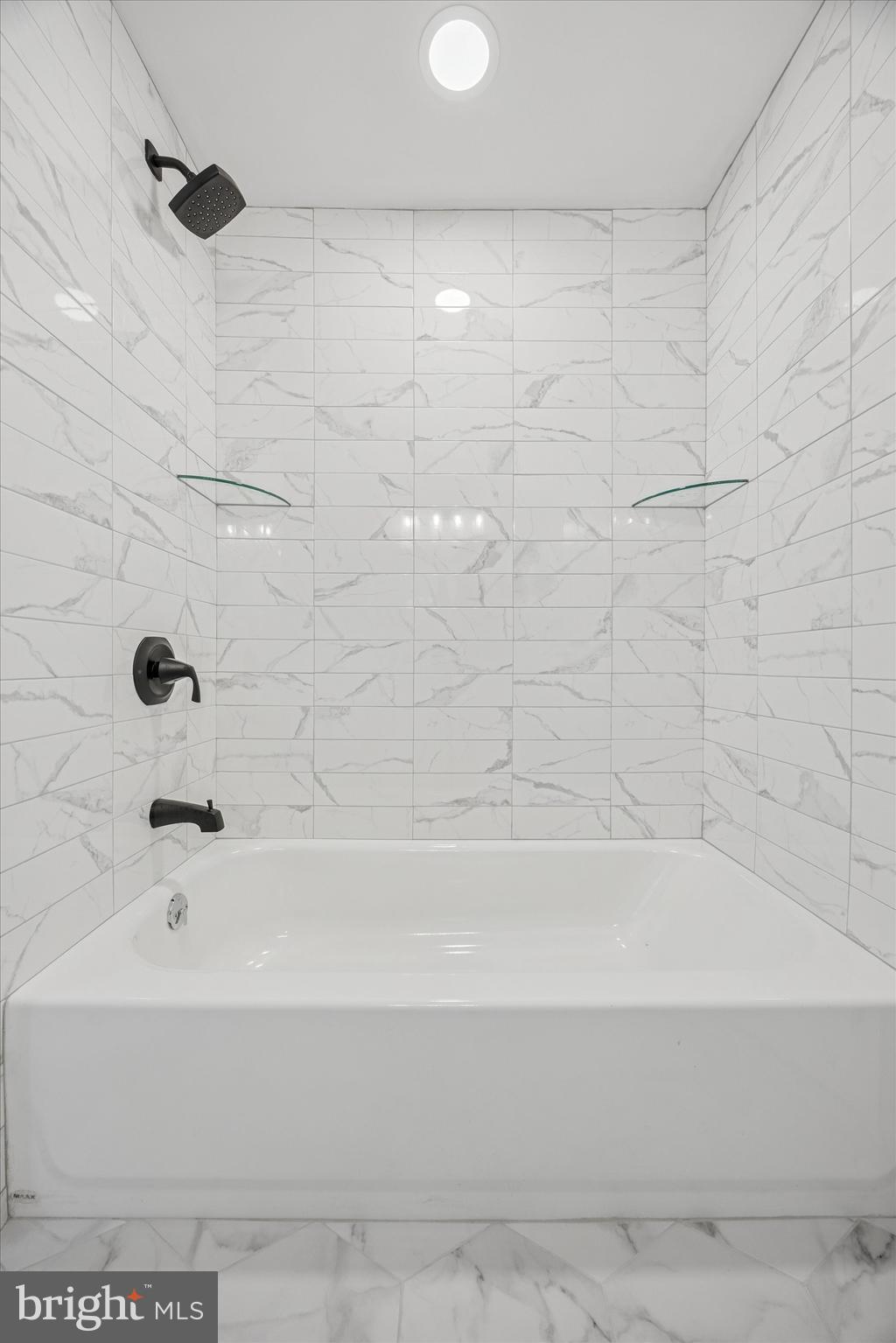 3011 Church Road Lafayette Hill, PA 19444 - Photo 23 of 30 a bathroom with a bathtub and a shower