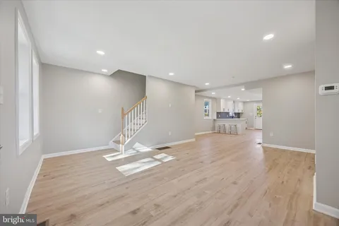 a view of a livingroom with wooden floor