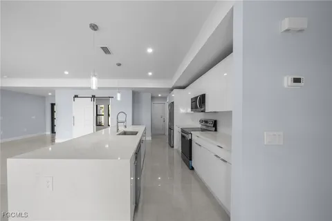 $353,900 | 2606 Northwest 10th Terrace, Cape Coral, FL 33993