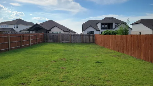 a view of a yard in front of house