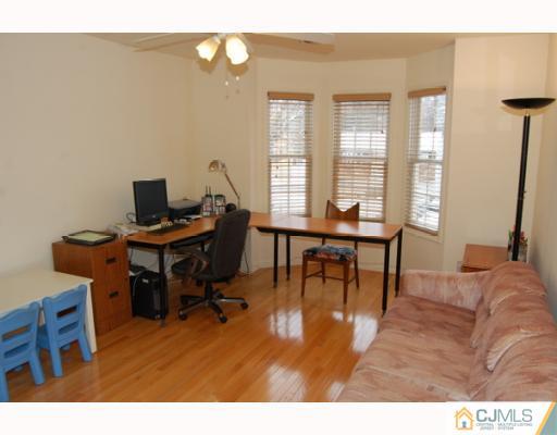 116 Harding Avenue Edison, NJ 08820 - Photo 9 of 10 a view of a workspace with furniture and a window