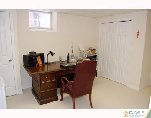 116 Harding Avenue Edison, NJ 08820 - Photo 10 of 10 a room with a desk and chair