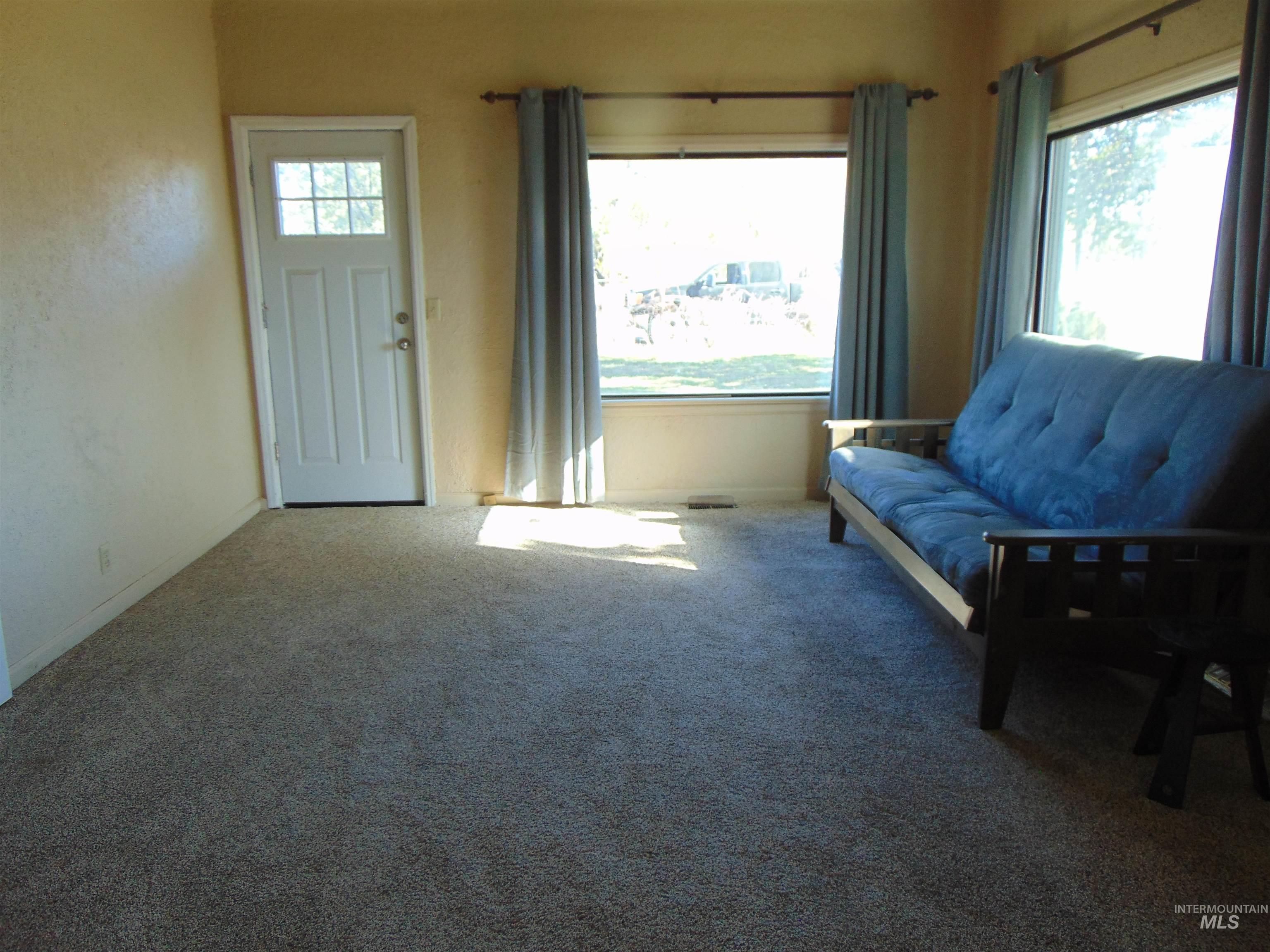 2933 2nd Street Harper, OR 97906 - Photo 12 of 28 Living room with carpet flooring and baseboards