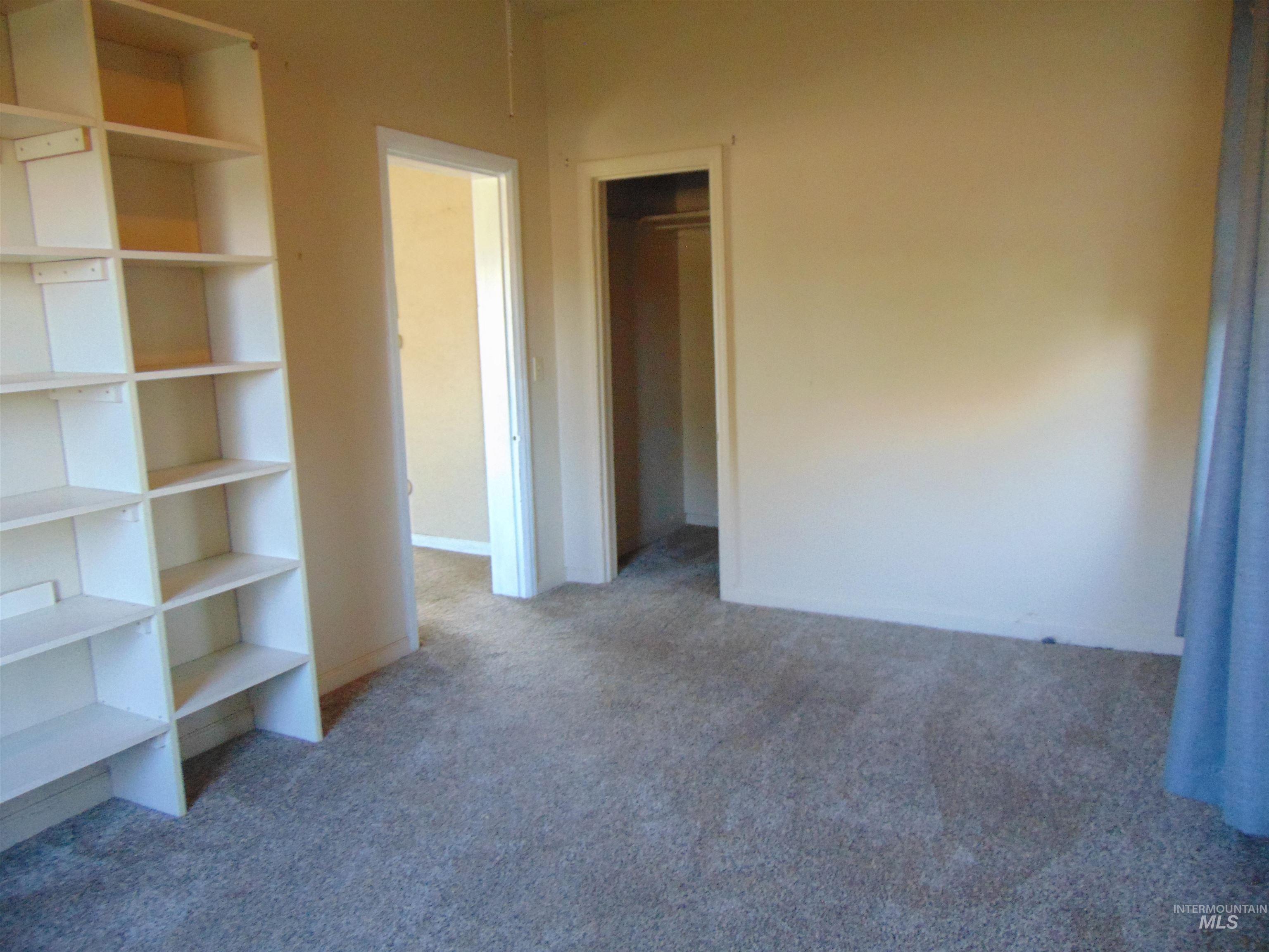 2933 2nd Street Harper, OR 97906 - Photo 14 of 28 Unfurnished bedroom featuring light carpet and a closet
