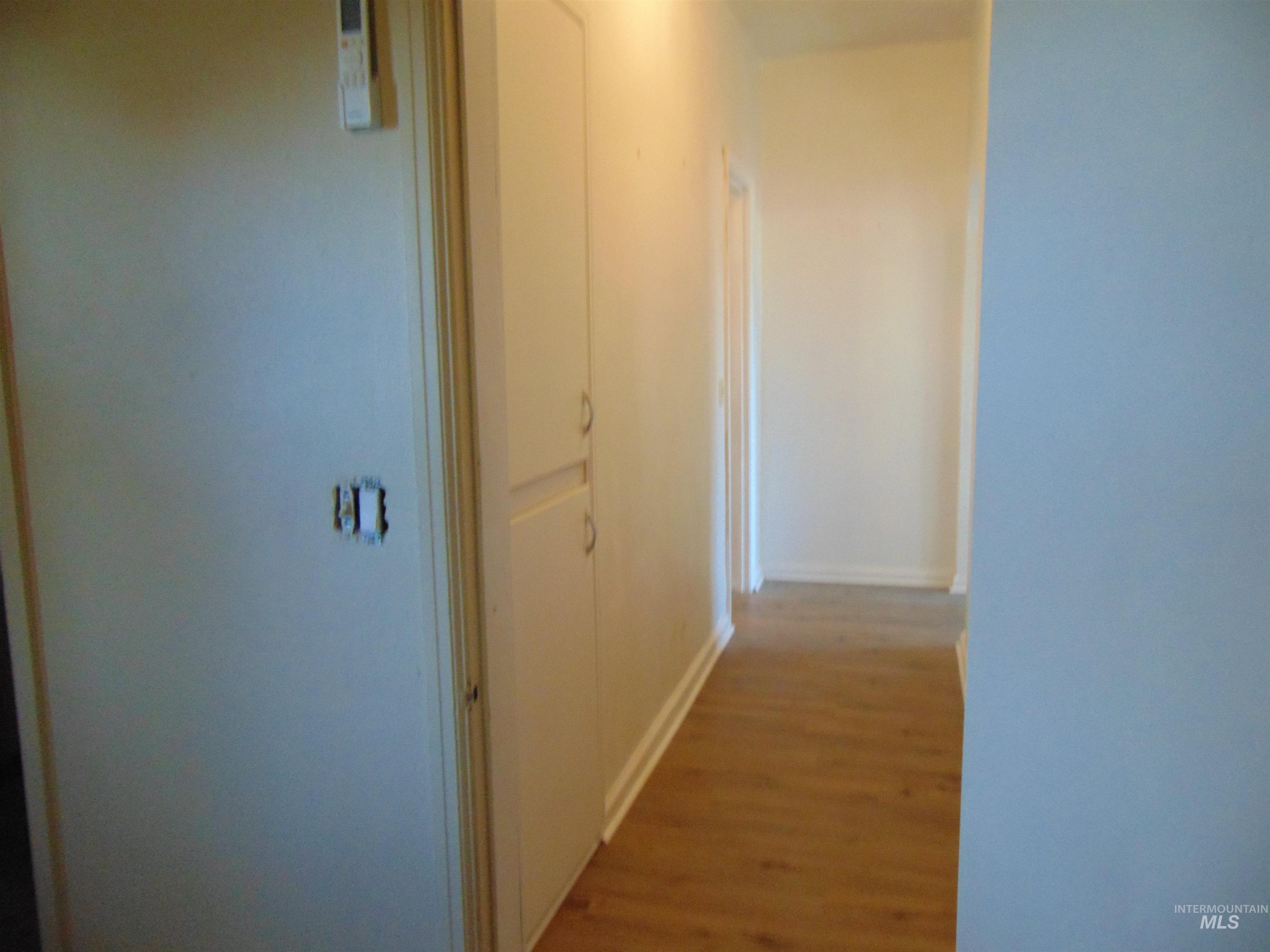 2933 2nd Street Harper, OR 97906 - Photo 19 of 28 Hall featuring wood finished floors and baseboards