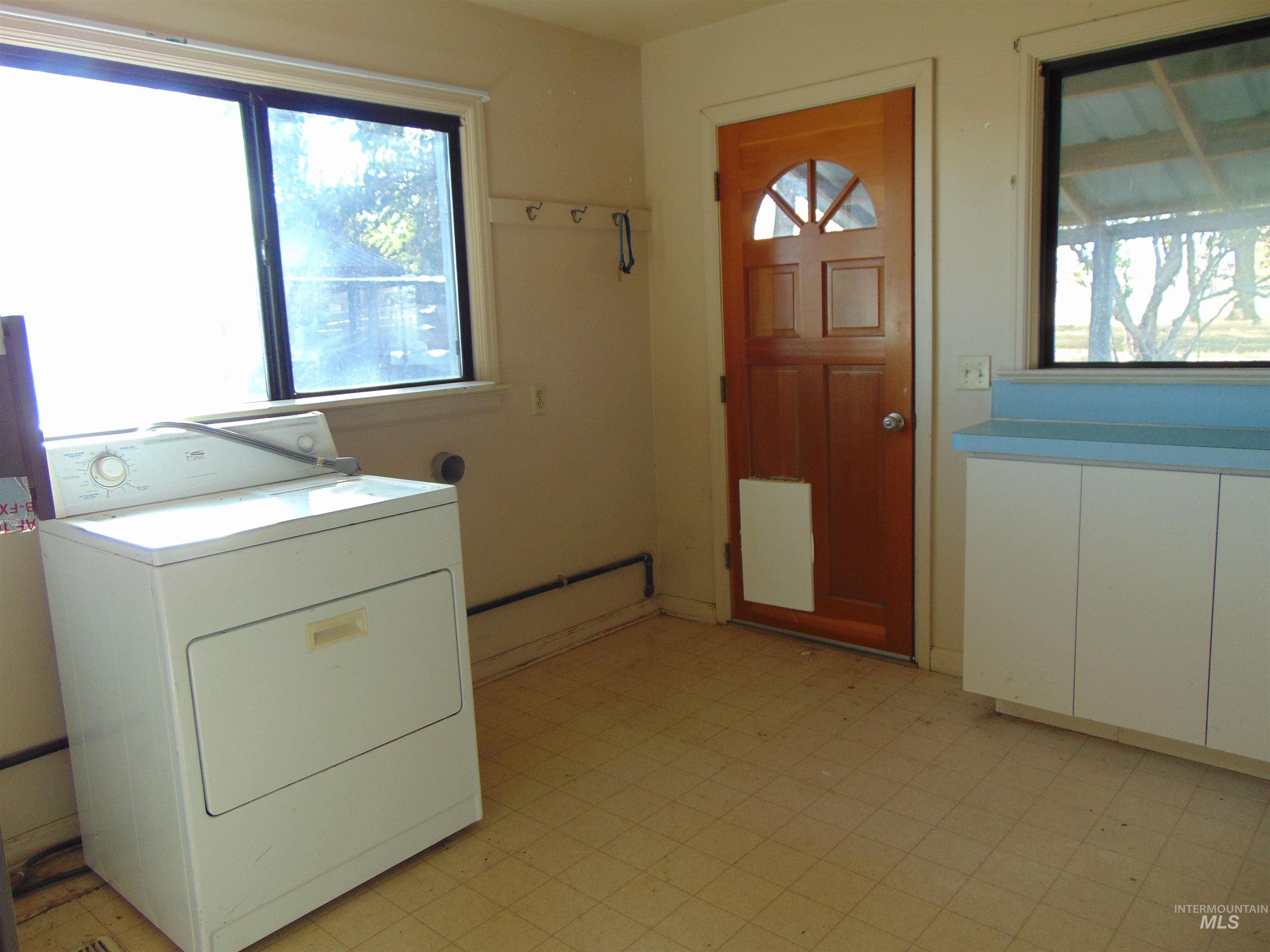 2933 2nd Street Harper, OR 97906 - Photo 23 of 28 Laundry room with washer / dryer and light flooring