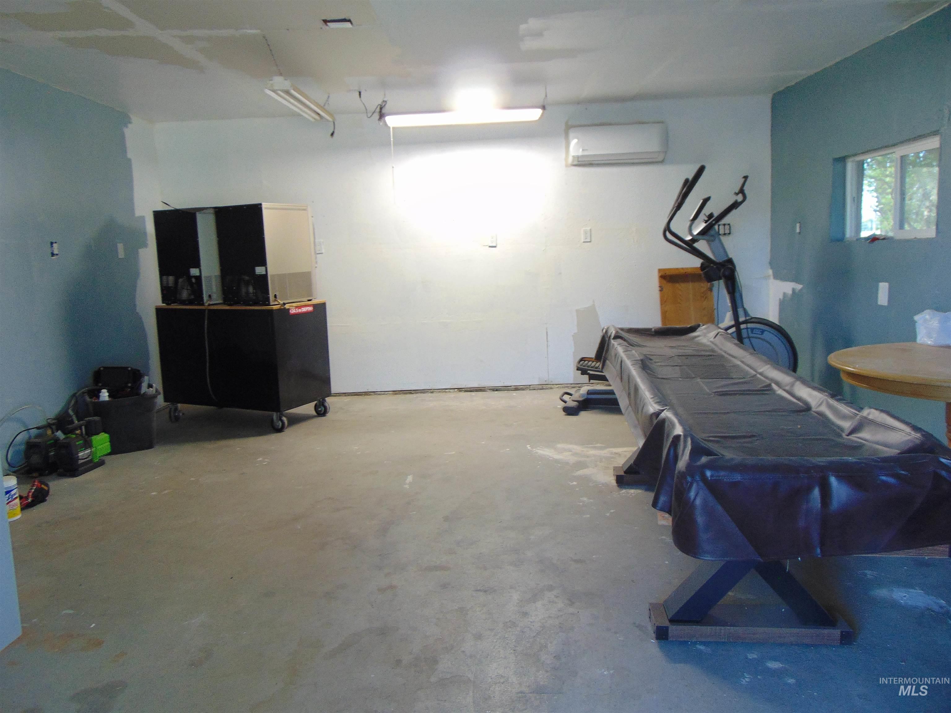 2933 2nd Street Harper, OR 97906 - Photo 24 of 28 Garage featuring a wall mounted AC