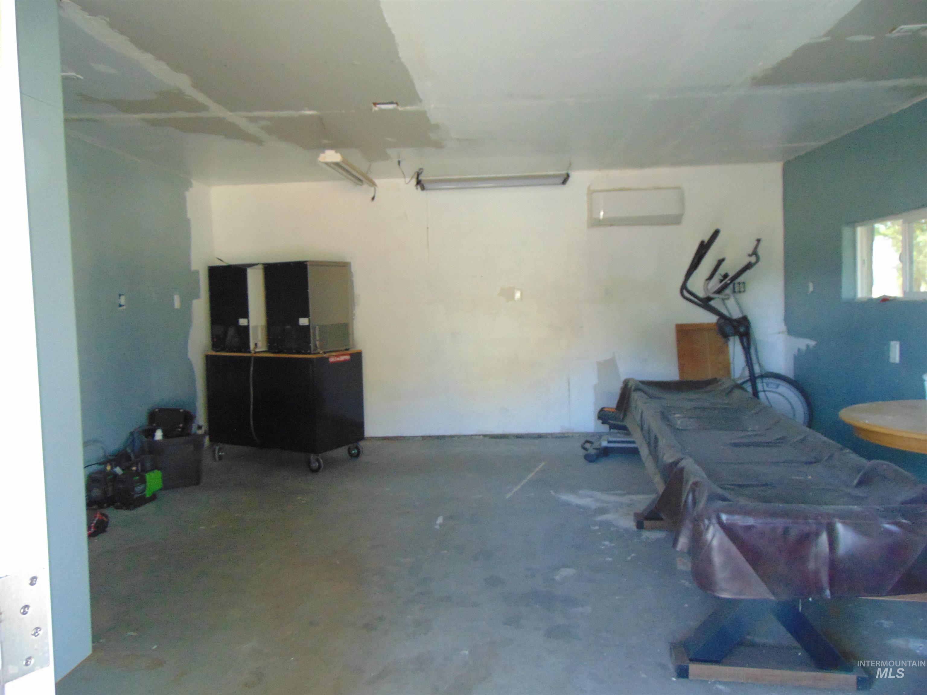 2933 2nd Street Harper, OR 97906 - Photo 25 of 28 Garage with an AC wall unit